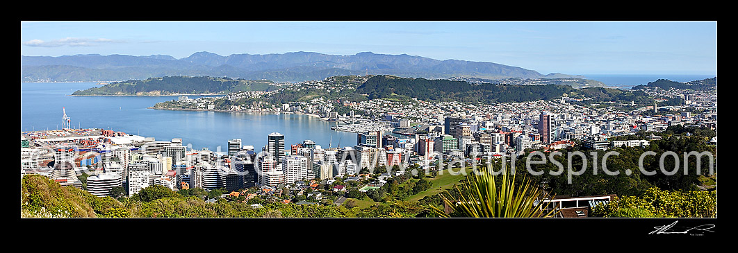 Image of Panorama of Wellington City buildings, CBD and Harbour around to Wellington Heads and Newtown. Remutaka (Rimutaka) Range behind, Wellington, Wellington City District, Wellington Region, New Zealand (NZ) stock photo image