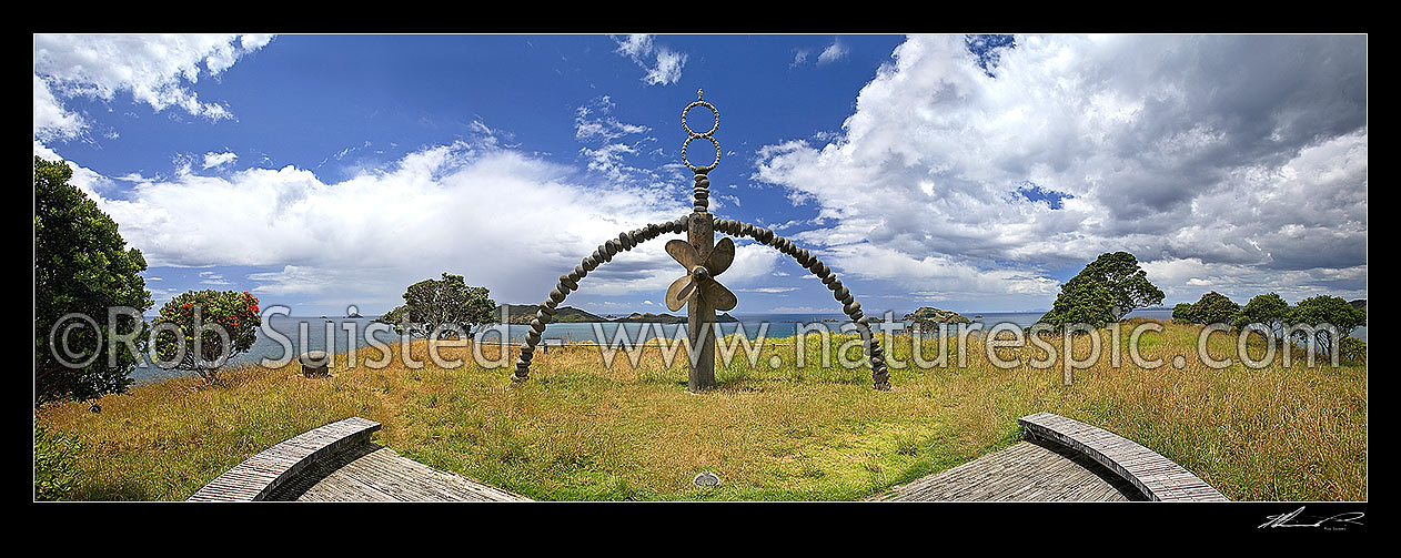 Image of Memorial sculpture for the Rainbow Warrior ship (by Chris Booth), above Matauri Bay, Motukawanui and Cavalli Islands and Passage. Panoramic view, Matauri Bay, Far North District, Northland Region, New Zealand (NZ) stock photo image