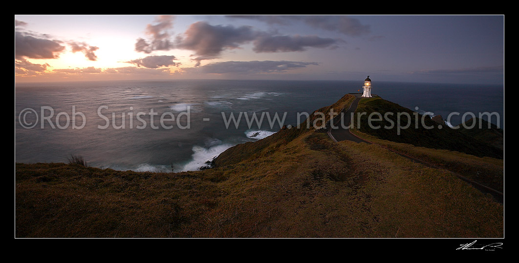 Image of Cape Reinga (Te Rerengawairua) lighthouse at dusk above Columbia Banks in the Tasman Sea. Panorama, Cape Reinga, Far North District, Northland Region, New Zealand (NZ) stock photo image