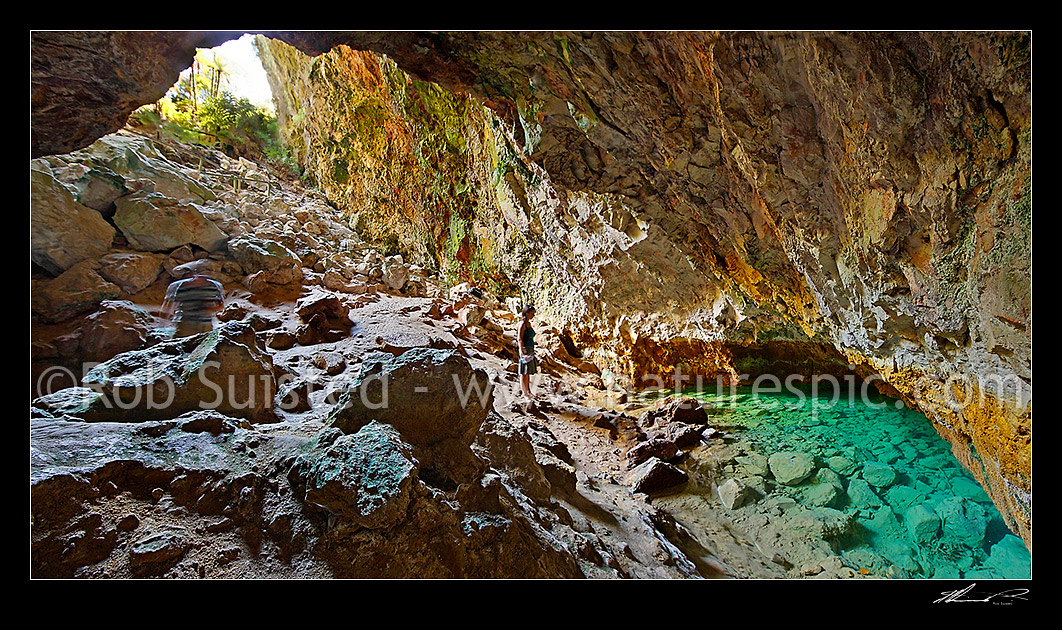 Image of Visitors viewing the geothermally active pool in Ruatapu Cave at Orakei Korako cave and thermal park, Lake Ohakuri, Rotorua, Rotorua District, Bay of Plenty Region, New Zealand (NZ) stock photo image