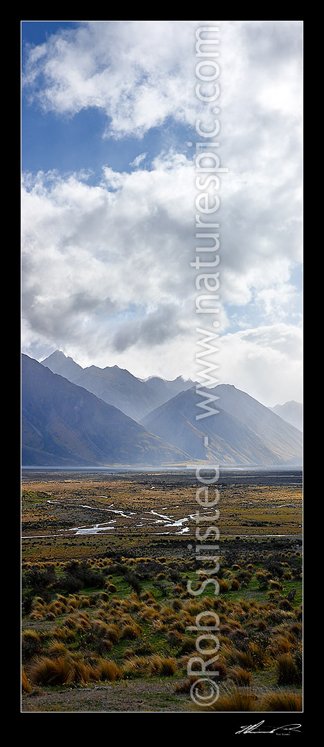 Image of Looking across Rangitata River from Mt Potts Station to rain coming down the Havelock River valley. Mesopotamia Station and Brabazon Range centre, Mt Potts, Ashburton District, Canterbury Region, New Zealand (NZ) stock photo image