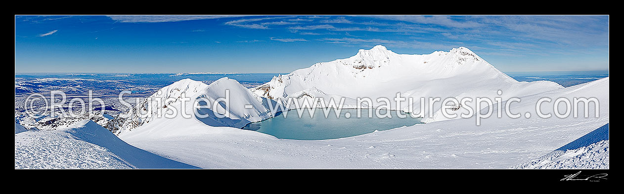 Image of Mount Ruapehu Crater Lake below the summit (Tahurangi 2797m), Pyramid Peak at left of lake. Wind blown sculptured ice formations and textures. Panorama, Tongariro National Park, Ruapehu District, Manawatu-Wanganui Region, New Zealand (NZ) stock photo image