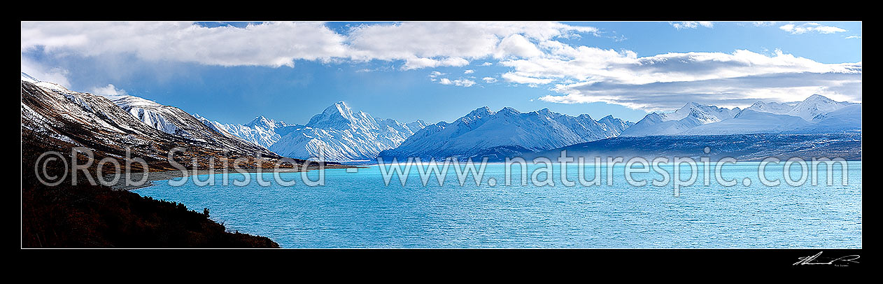 Image of Aoraki / Mount Cook (3754m) and Lake Pukaki in winter. Mt La Perouse (3078m) left, Tasman Valley and Burnett Mountains Range centre. Panorama, Aoraki / Mount Cook National Park, MacKenzie District, Canterbury Region, New Zealand (NZ) stock photo image