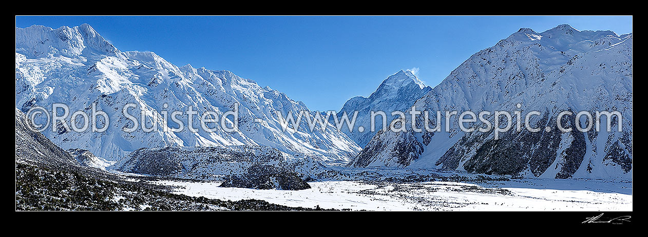 Image of Aoraki / Mount Cook (3754m) in winter snow. Mt Sefton far left (3151m) Mt Cook Range right. Hooker River Valley. Panorama, Aoraki / Mount Cook National Park, MacKenzie District, Canterbury Region, New Zealand (NZ) stock photo image