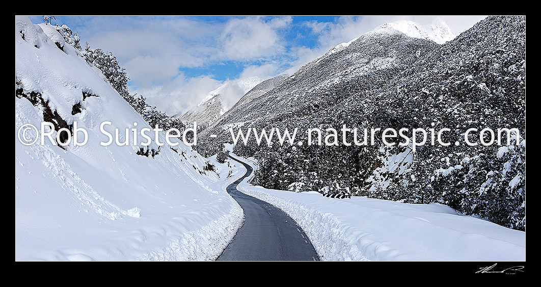 Image of Arthur's Pass road in heavy winter snow. State Highway 73 to West Coast. Looking east. Panorama, Arthur's Pass National Park, Selwyn District, Canterbury Region, New Zealand (NZ) stock photo image