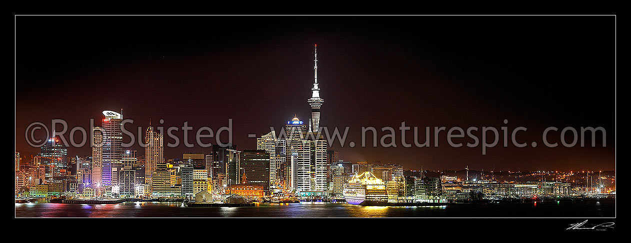 Image of Auckland City night time panorama of CBD, buildings, waterfront and Sky tower from Devonport, with cruise ship berthed, Auckland City, Auckland City District, Auckland Region, New Zealand (NZ) stock photo image