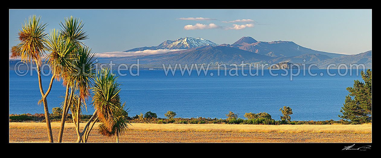 Image of Lake Taupo panorama with Central Plateau volcanic mountains beyond, Mountains Ruapehu, Ngauruhoe and Tongariro and National Park, Taupo, Taupo District, Waikato Region, New Zealand (NZ) stock photo image