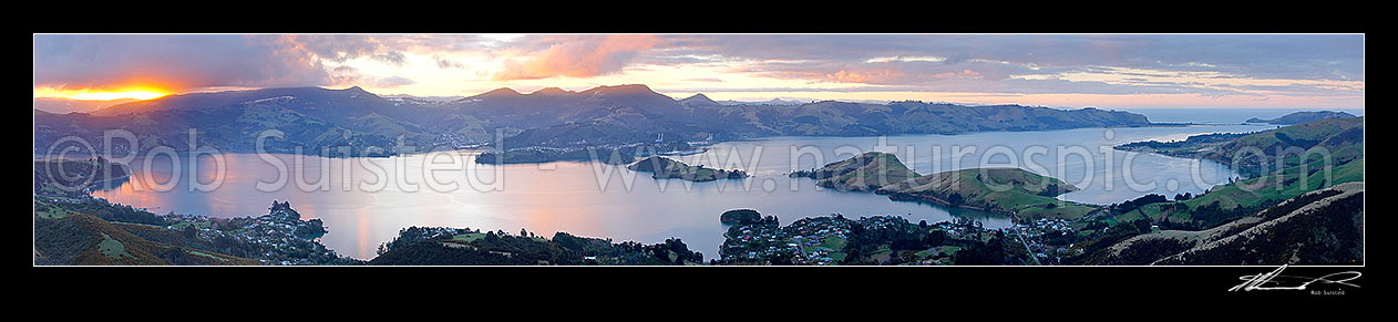 Image of Otago Harbour evening panorama looking over Port Chalmers, Broad Bay, Portobello to entrance, Aramoana and Taiaroa Head (right), Otago Peninsula, Dunedin City District, Otago Region, New Zealand (NZ) stock photo image