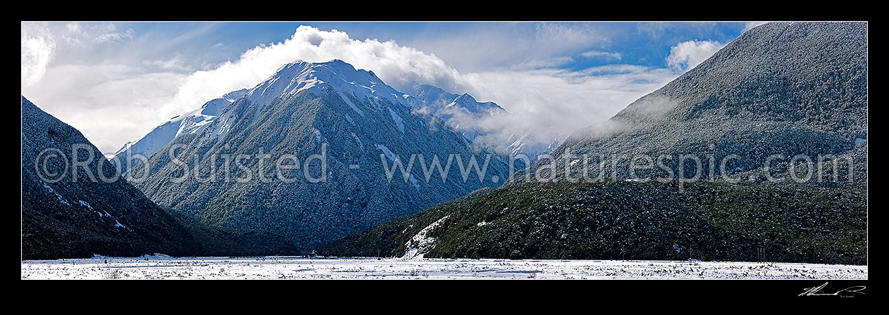 Image of Bealey River Valley with Mount O'Malley (1703m) cloaked in heavy winter snowfall. Mingha River valley centre, Arthur's Pass National Park, Selwyn District, Canterbury Region, New Zealand (NZ) stock photo image