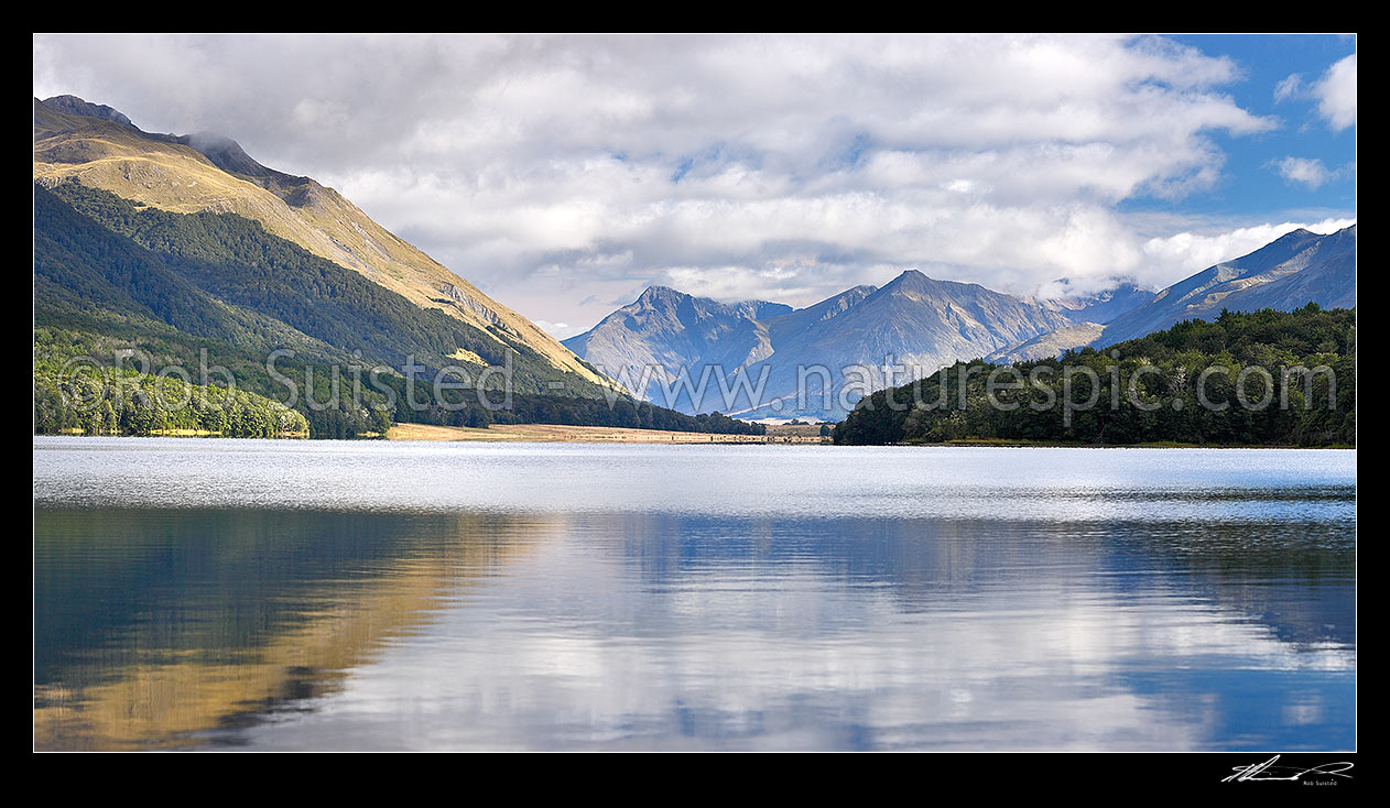 Image of South Mavora Lake nestled between the Livingstone and Thomson Mountains ranges. Snowdon Forest Conservation Area & Mararoa River Valley panorama, Mavora Lakes, Te Anau, Southland District, Southland Region, New Zealand (NZ) stock photo image