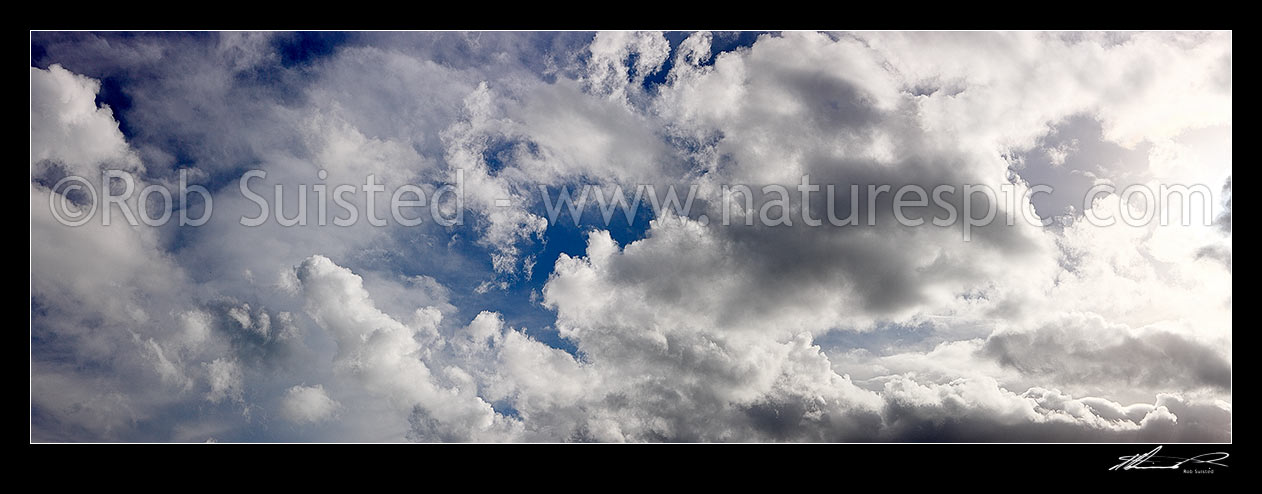 Image of White fluffy clouds in blue sky. Very large panorama file suitable for murals, New Zealand (NZ) stock photo image