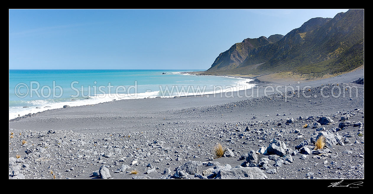 Image of Ngapotiki shingle fan and coastline west of Cape Palliser. Aorangi Range rising from the sea. Panorama, Cape Palliser, South Wairarapa District, Wellington Region, New Zealand (NZ) stock photo image