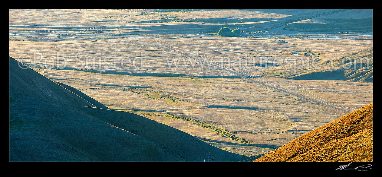 Image of Electricity transmission powerlines running up the Acheron River valley, see from Ward Pass. Panorama, Molesworth Station, Marlborough District, Marlborough Region, New Zealand (NZ) stock photo image