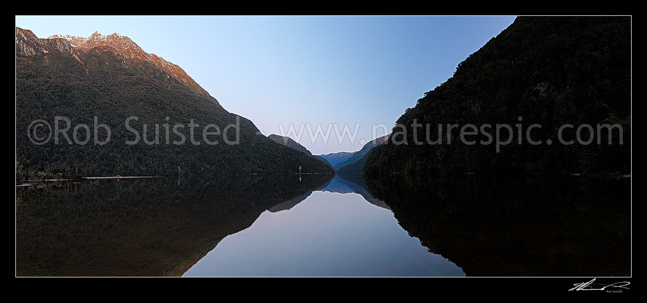 Image of Lake Te Anau Narrows from the Glaisnock River beach at twilight. Turret Peaks distant. Glaisnock Wilderness Area. Panorama, Fiordland National Park, Southland District, Southland Region, New Zealand (NZ) stock photo image