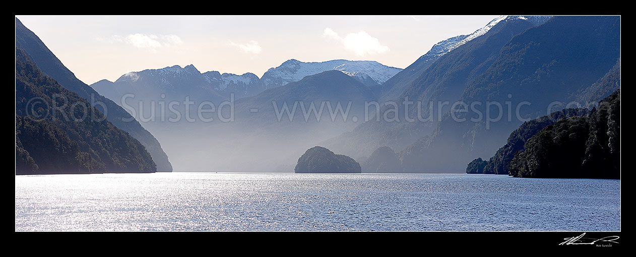 Image of Doubtful Sound / Patea with Fergusson Island centre and Elizabeth Is. far right. Wilderness winter panorama, Doubtful Sound, Fiordland National Park, Southland District, Southland Region, New Zealand (NZ) stock photo image