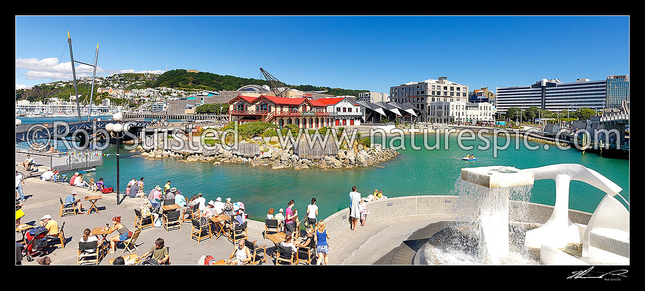 Image of Wellington waterfront city lagoon with historic Rowing and Boating club, Wharewaka, Odlins and St Johns Ambulance buildings. Albatross Sculpture by Tanya Ashken. Panorama, Wellington, Wellington City District, Wellington Region, New Zealand (NZ) stock photo image