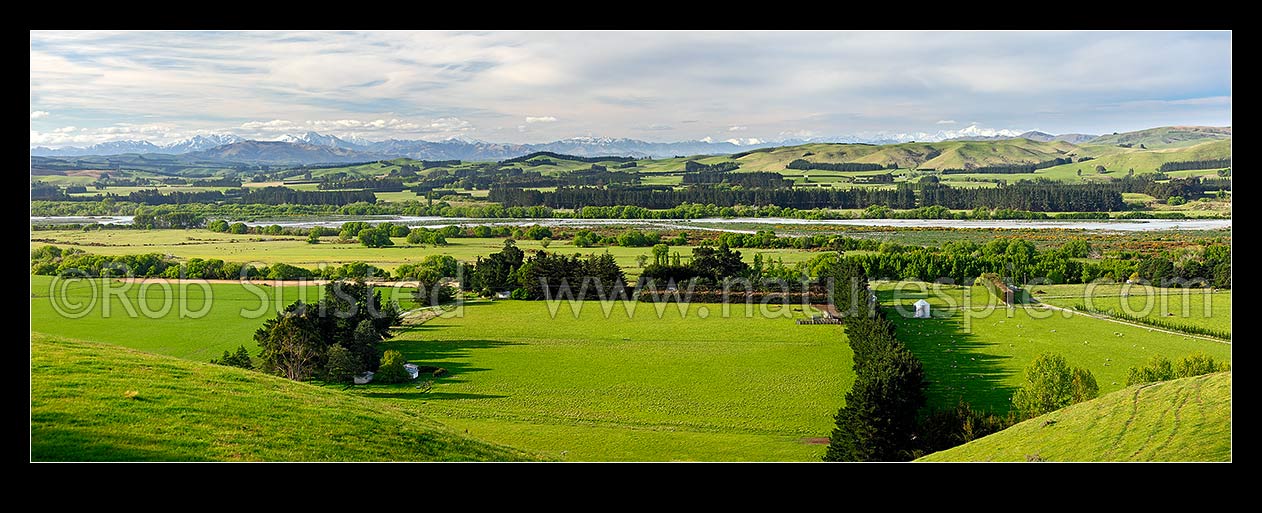 Image of Hurunui River and farmland near Domett, panorama with the Kaikoura Ranges and Mount Tapuae-o-Uenuku (centre) behind, Hurunui Mouth, Hurunui District, Canterbury Region, New Zealand (NZ) stock photo image