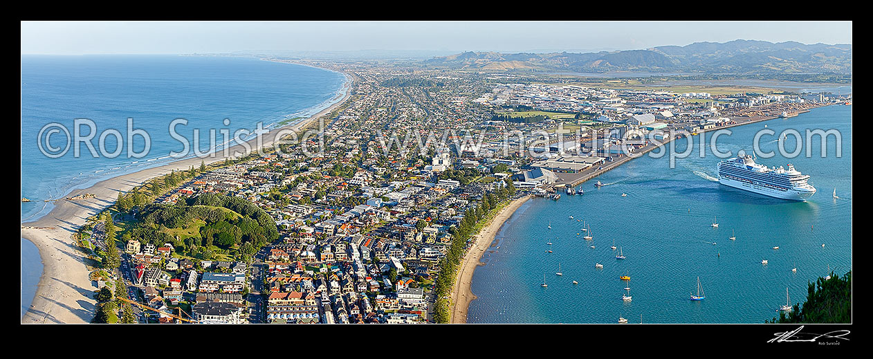 Image of View from Mt Maunganui (232m) over beach and Moturiki and Motuotau Islands, towards Papamoa, Tauranga Harbour right with Diamond Princess cruise ship leaving. Panorama, Mount Maunganui, Tauranga District, Bay of Plenty Region, New Zealand (NZ) stock photo image