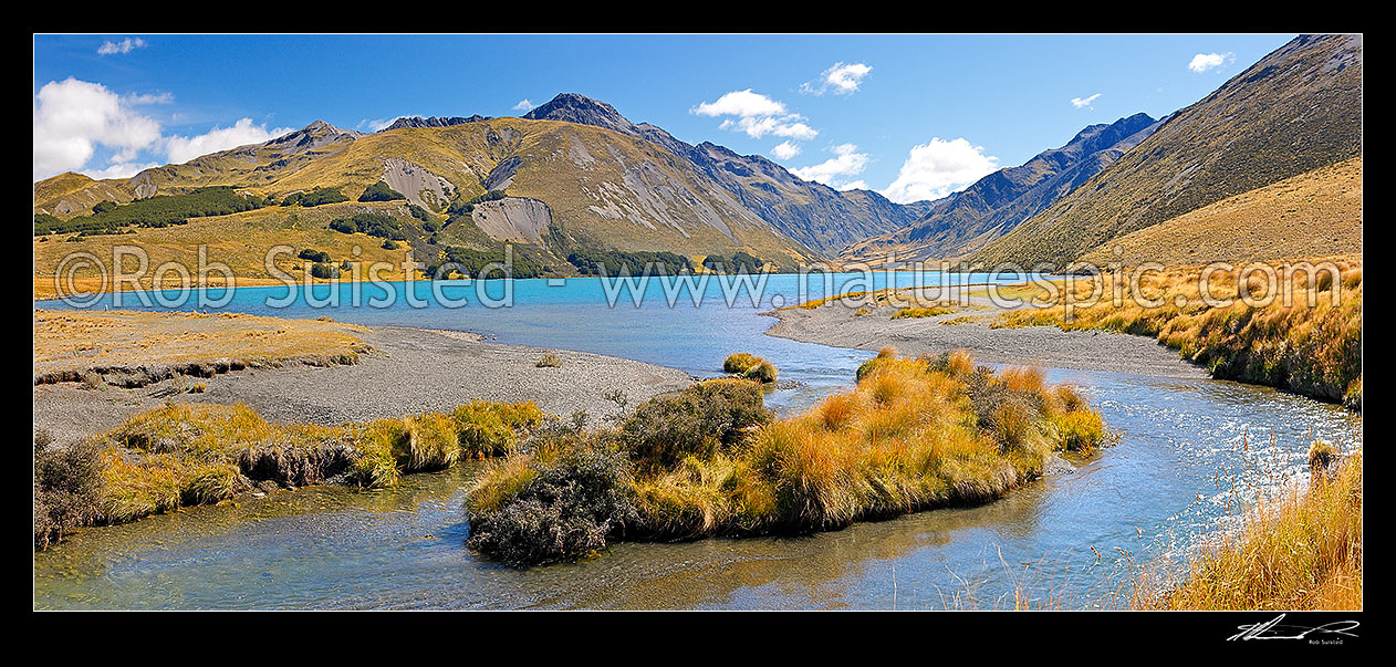 Image of Lake Tennyson draining into the Clarence River. Lake Tennyson Scenic Reserve. Saint James Range and Mount McCabe (1606m) centre left. Panorama, St James Station, Hurunui District, Canterbury Region, New Zealand (NZ) stock photo image