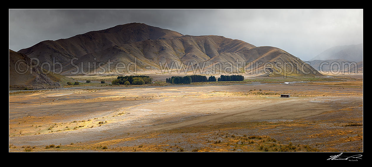 Image of Red Gate hut, airstrip and barn in the Severn River Valley (Alma River far left). Travellers Valley and Tarndale Brook far right. Panorama, Molesworth Station, Marlborough District, Marlborough Region, New Zealand (NZ) stock photo image