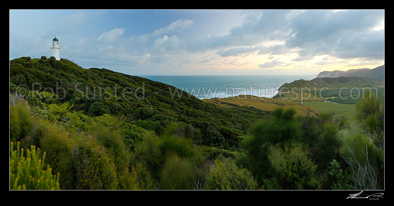 Image of East Cape and lighthouse at sunset, Tunanui Stream and Waikori Bluff distant right. Panorama, East Cape, Gisborne District, Gisborne Region, New Zealand (NZ) stock photo image