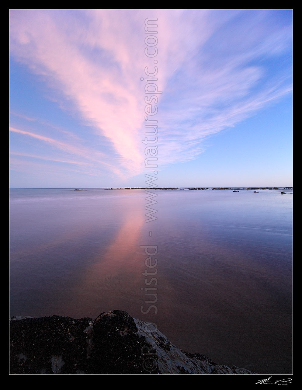 Image of Sunest clouds reflected in beach sands of Port Awanui. Square format, Port Awanui, East Coast, Gisborne District, Gisborne Region, New Zealand (NZ) stock photo image