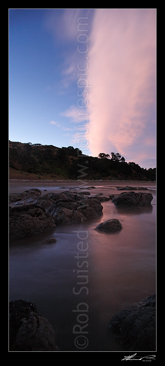 Image of Port Awanui beach and clouds at sunset twilight. Vertical panorama, Port Awanui, East Coast, Gisborne District, Gisborne Region, New Zealand (NZ) stock photo image