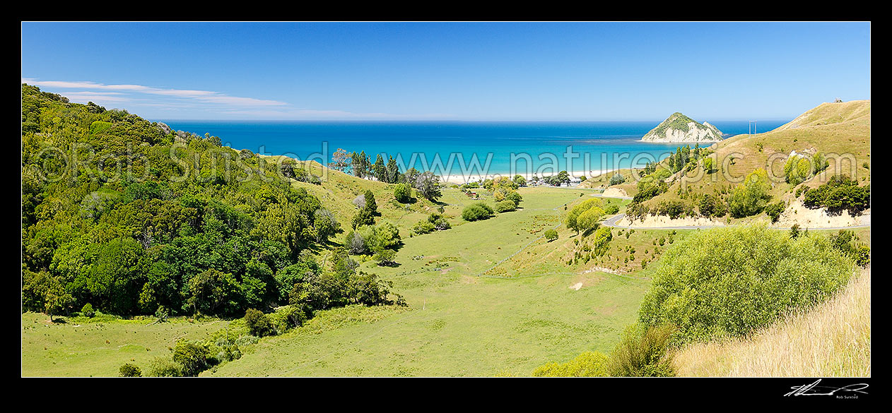 Image of Anaura Bay, Cook's landing place in 1769, with Motuoroi Island left. Panorama, Anaura Bay, Gisborne District, Gisborne Region, New Zealand (NZ) stock photo image