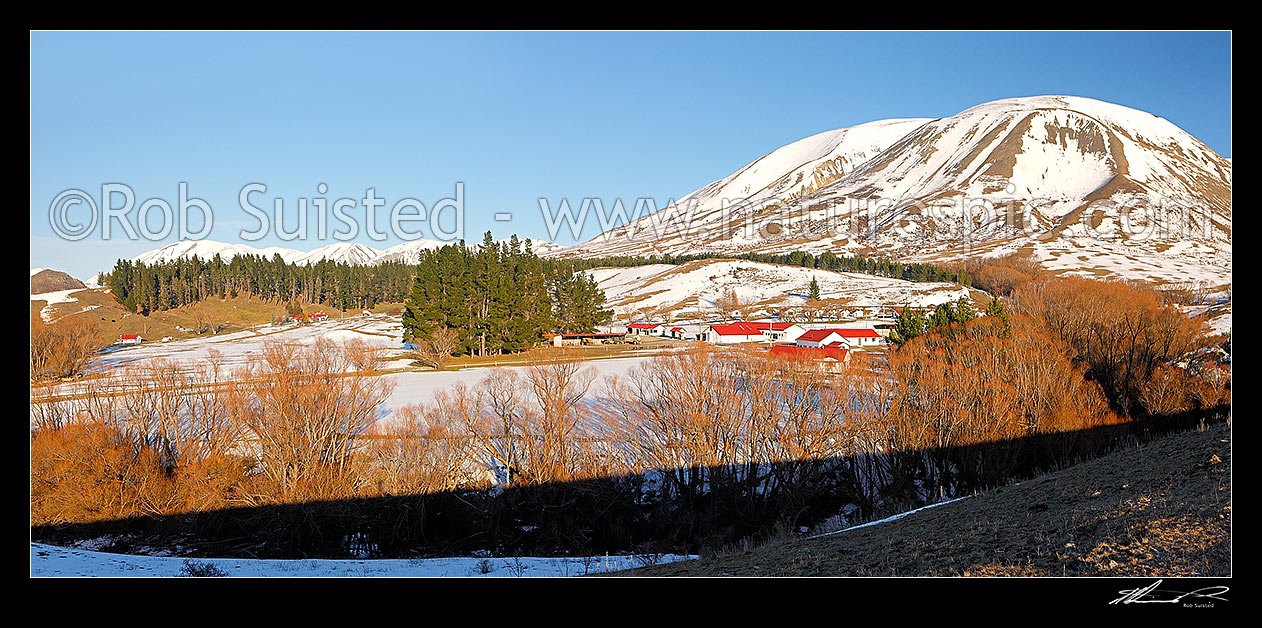 Image of Molesworth Station buildings under Mount Chisholm in winter. Panorama, Molesworth Station, Marlborough District, Marlborough Region, New Zealand (NZ) stock photo image