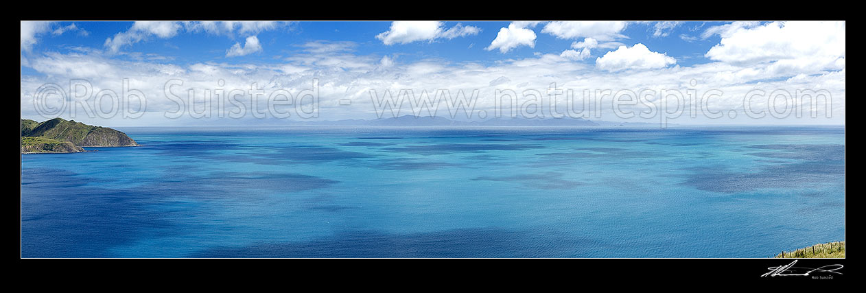 Image of Cook Strait. Ohau Point at left, South Island, Marlborough Sounds and The Brothers in distance. Summer panorama from above Opau Bay, Makara Beach, Wellington City District, Wellington Region, New Zealand (NZ) stock photo image