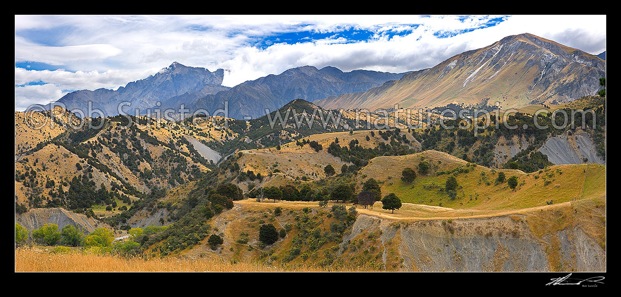 Image of Mount Tapuae-o-Uenuku (2885m, left) above Bluff Station with limestone Mead Hill (1068m) far right. Panorama, Kekerengu, Kaikoura District, Canterbury Region, New Zealand (NZ) stock photo image