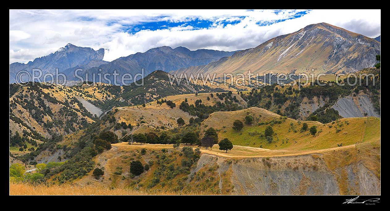 Image of Mount Tapuae-o-Uenuku (2885m, left) above Bluff Station with limestone Mead Hill (1068m) far right. Panorama, Kekerengu, Kaikoura District, Canterbury Region, New Zealand (NZ) stock photo image