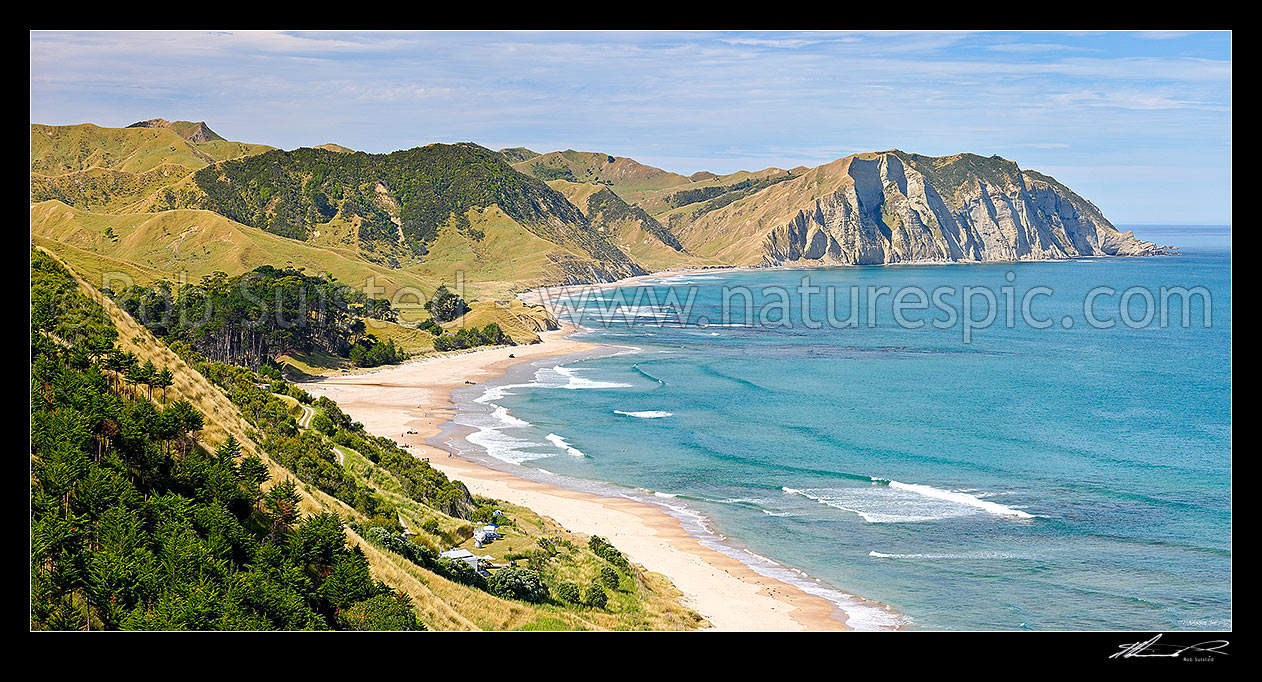 Image of Waihau Bay and Waihau Beach panorama in summer, Tolaga Bay, Gisborne District, Gisborne Region, New Zealand (NZ) stock photo image