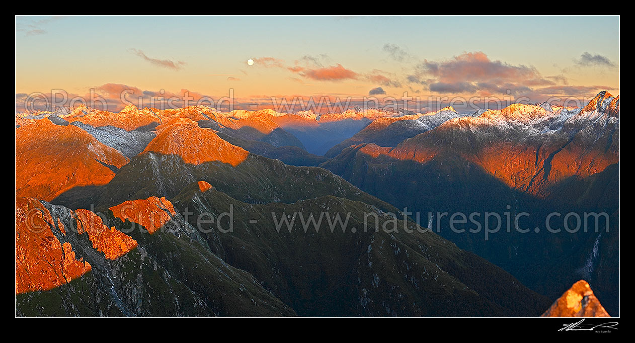 Image of Looking ENE along Edith - George River alpine tops to the head of the Edith River at dusk. Edith Saddle centre with full moon above. Glaisnock Wilderness Area. Panorama, Fiordland National Park, Southland District, Southland Region, New Zealand (NZ) stock photo image