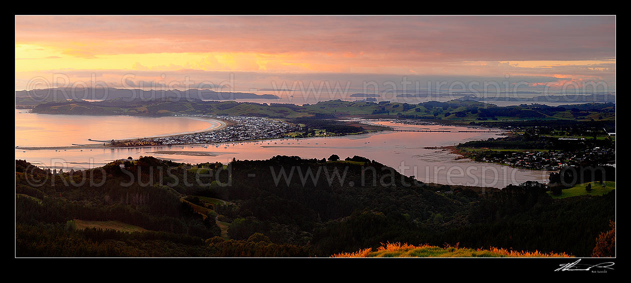 Image of Omaha Beach and Whangateau Harbour, with Kawau Island far left. Sunrise. Panorama, Leigh, Rodney District, Auckland Region, New Zealand (NZ) stock photo image