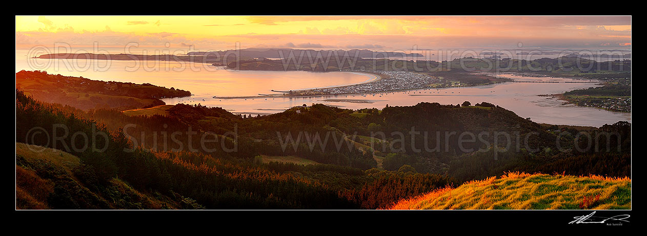 Image of Omaha Beach, Takatu Pont and Ti Point (left) and Whangateau Harbour, with Kawau Island far left. Sunrise. Panorama, Leigh, Rodney District, Auckland Region, New Zealand (NZ) stock photo image