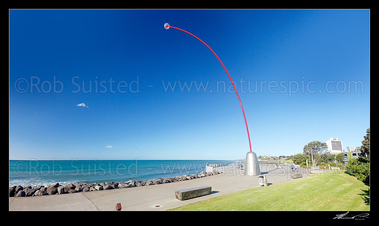 Image of Len Lye's Wind Wand, a 48-metre kinetic sculpture, on the waterfront. Panorama, New Plymouth, New Plymouth District, Taranaki Region, New Zealand (NZ) stock photo image