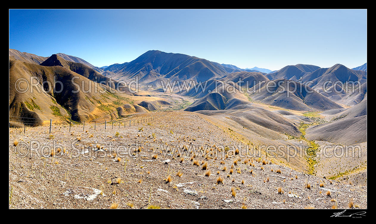 Image of Guide River, a tributary of the Acheron River, and Barefell Pass (left), Half Moon Stream and Dillion country right. Summer panorama, Molesworth Station, Marlborough District, Marlborough Region, New Zealand (NZ) stock photo image