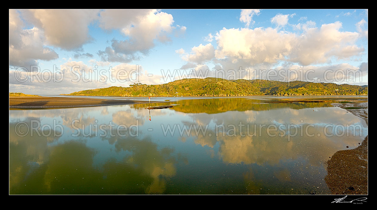 Image of Raglan, with Putoetoe Point and the Raglan harbour entrance and bar at left, and Rangitoto Point behind. Panorama, Raglan, Waikato District, Waikato Region, New Zealand (NZ) stock photo image