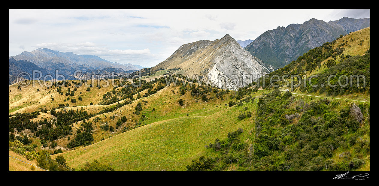 Image of Mead Stream cutting through the Chalk Range. Clarence River valley left, Limestone Hill (840m) centre, Mead Stream and Red Spur far right. Panorama, Bluff Station, Kaikoura District, Canterbury Region, New Zealand (NZ) stock photo image