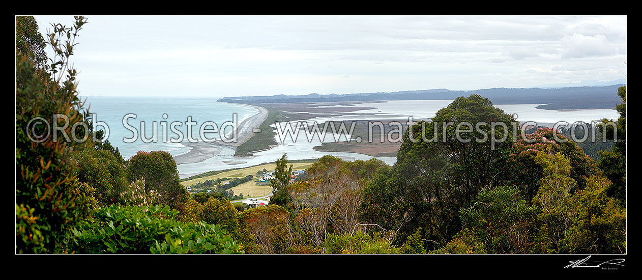 Image of Okarito township, river mouth and Okarito Lagoon seen from Okarito Trig walk (158m). Panorama, Westland / Tai Poutini National Park, Westland District, West Coast Region, New Zealand (NZ) stock photo image