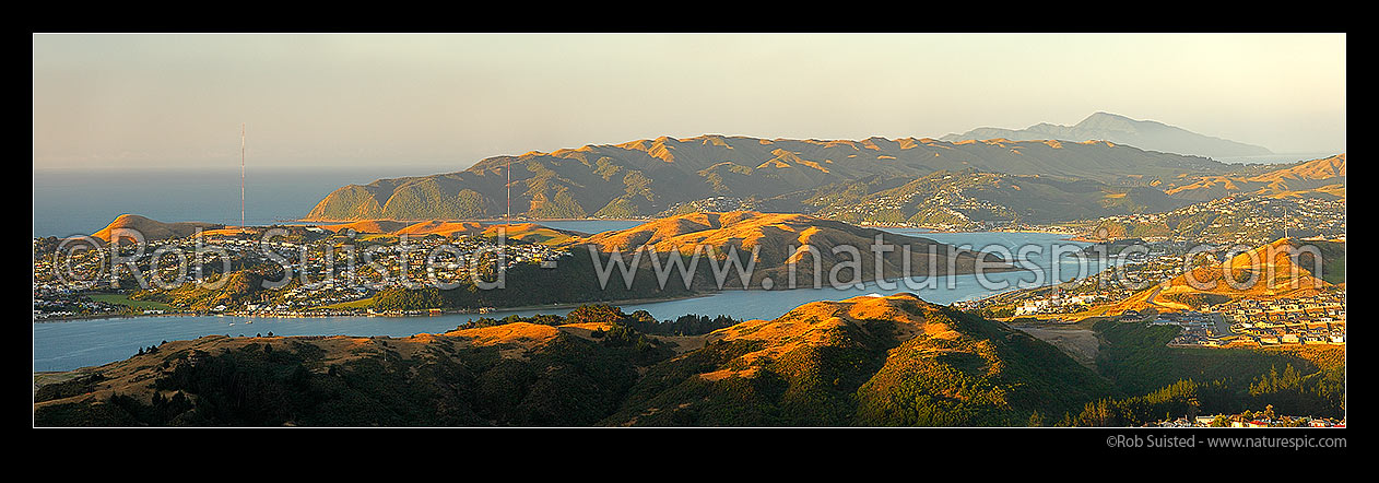 Image of Porirua Harbour with Titahi Bay left, Paremata, Mana, Plimmerton and Kapiti Island distant right. Panorama, Porirua, Porirua City District, Wellington Region, New Zealand (NZ) stock photo image