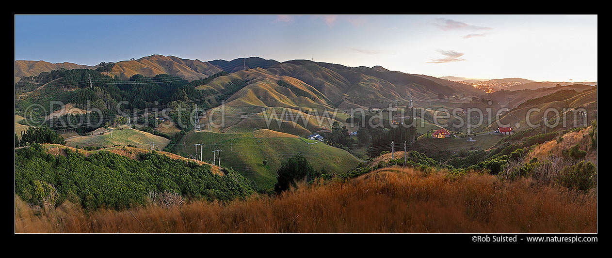 Image of Takapu Valley, looking from head toward Grenada North and SH1 in distance. Belmont Regional Park far right. Takapu Road. Panorama, Tawa, Wellington City District, Wellington Region, New Zealand (NZ) stock photo image