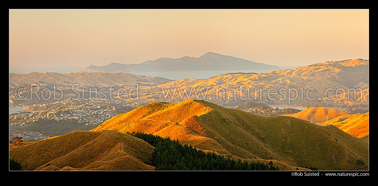 Image of Kapiti Island seen from Belmont Regional Park. Plimmerton and Porirua Harbour left, Pauatahanui inlet right. Panorama, Belmont Regional Park, Porirua City District, Wellington Region, New Zealand (NZ) stock photo image