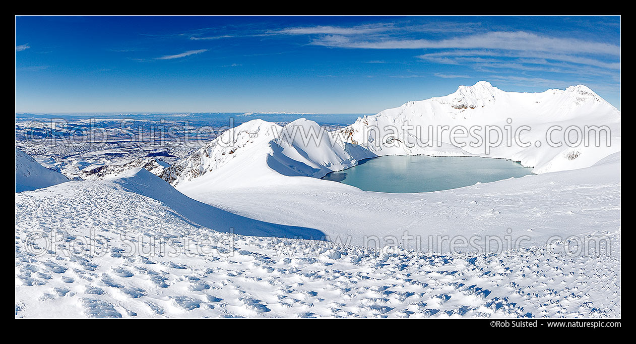 Image of Mount Ruapehu summit plateau (left) and Crater Lake below the summit (Tahurangi 2797m). Wind blown sculptured ice formations and textures, Tongariro National Park, Ruapehu District, Manawatu-Wanganui Region, New Zealand (NZ) stock photo image