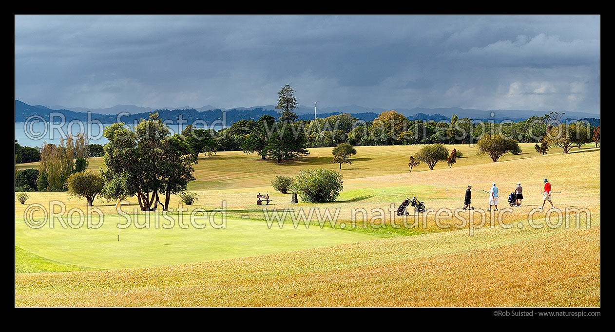 Image of Waitangi Golf Club over looking the Bay of Islands towards Russell. Panorama, Pahia, Bay of Islands, Far North District, Northland Region, New Zealand (NZ) stock photo image