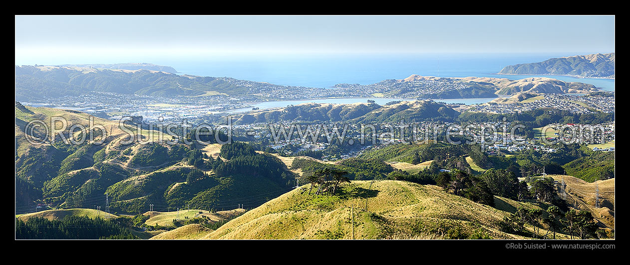 Image of Porirua harbour panorama. Porirua City, Elsdon, Titahi Bay, Mana Island, Cannons Creek, Porirua East from Belmont Regional Park, above Takapu Valley head, Porirua, Porirua City District, Wellington Region, New Zealand (NZ) stock photo image