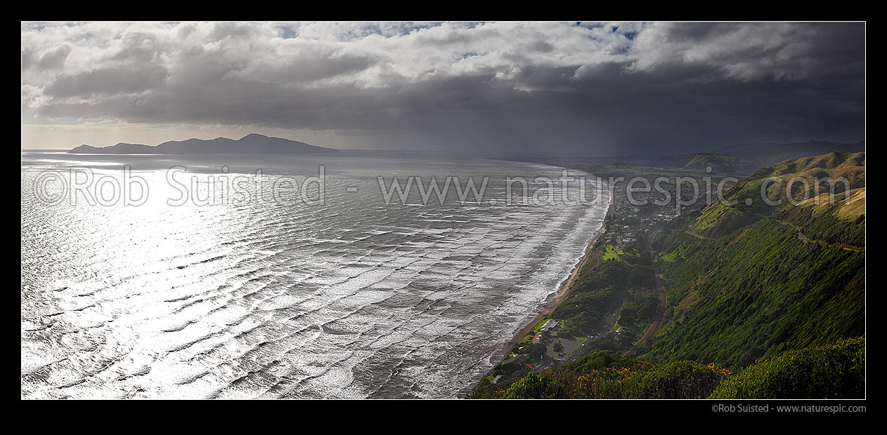 Image of Kapiti coastline panorama on a stormy day. Kapiti Island left, Paraparaumu centre, Paekakariki township right, Paekakariki, Kapiti Coast District, Wellington Region, New Zealand (NZ) stock photo image