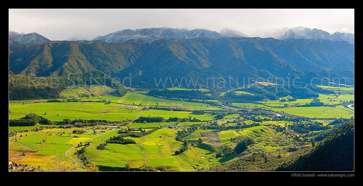 Image of Upper Takaka Valley, looking across to the Anatoki and Devil Ranges in Kahurangi National Park. Fresh winter snow. Panorama, Upper Takaka, Tasman District, Tasman Region, New Zealand (NZ) stock photo image