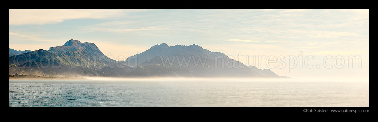 Image of Mt Alexander (1197m left), Seaward Valley, Mts Batty (1195m) and Patutu (1162m) (centre), to Clarence River, seen looking north from offshore of Kaikoura in morning light. Panorama, Kaikoura, Kaikoura District, Canterbury Region, New Zealand (NZ) stock photo image